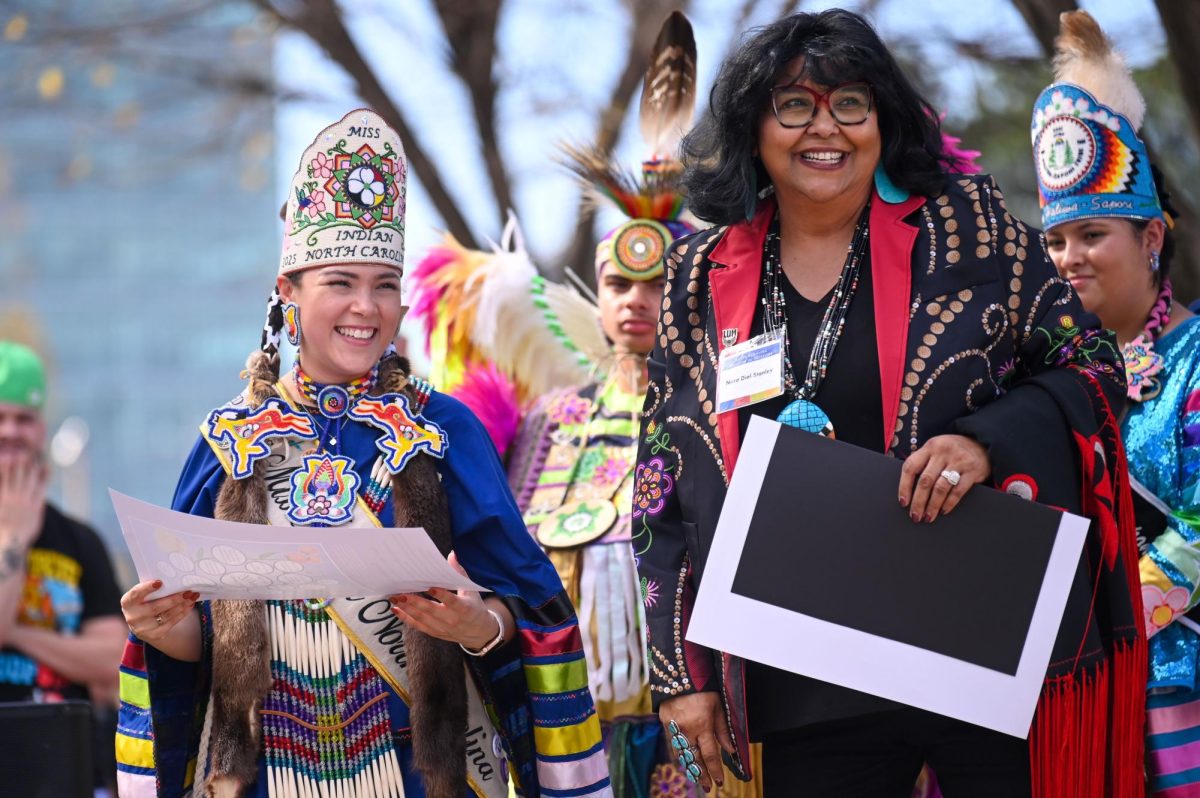 Page Freeman, named Miss Indian of 2025-2026, and Nora Dial-Stanley, smile together during the 30th Annual American Indian Heritage Celebration at the North Carolina Museum of Art on Saturday, Nov. 22, 2025. 