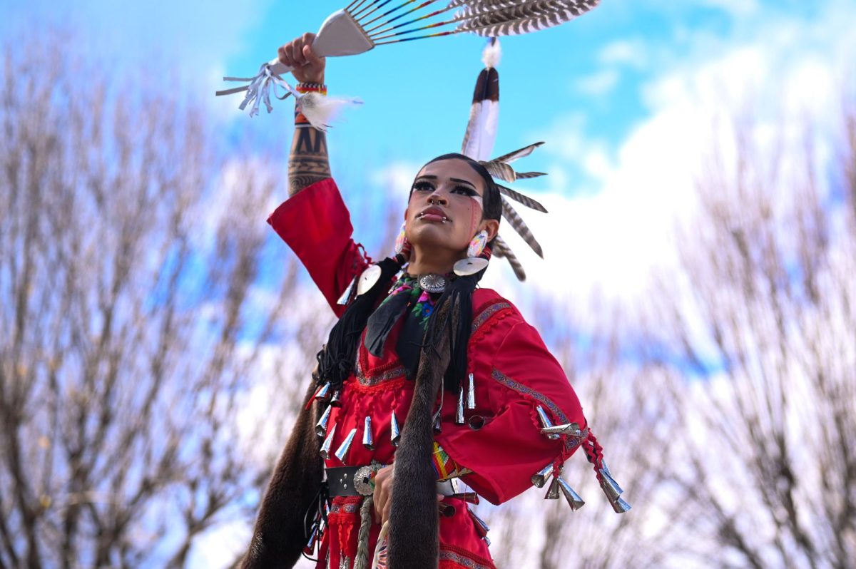 Jarrett Stephens, a member of the Eastern Band Cherokee tribe, dances with a fan while in her regalia during the 30th Annual American Indian Heritage Celebration at the North Carolina Museum of Art on Saturday, Nov. 22, 2025. 