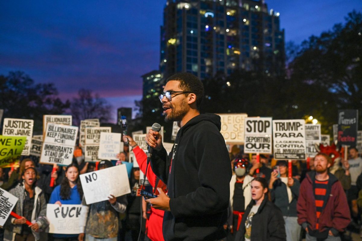 Protest organizer Prince Williams gives a speech before the protest march in downtown Raleigh during the "No Border Patrol in Raleigh" protest on Tuesday, Nov. 18, 2025. The protest was organized by the social organizations Party For Socialism and Liberation, Nuestro Barrio Cafe, PalyYouthNC and 50501NC.