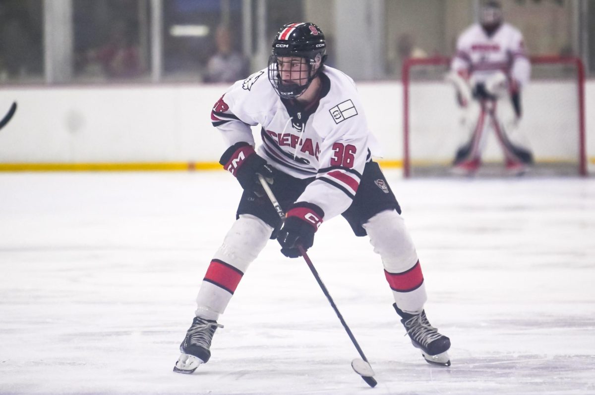 Sophomore forward Erik Dahlin controls the puck during the game against George Mason at Invisalign Arena on Friday, Nov. 21, 2025. Dahlin has played in 17 games this season. NC State lost to George Mason 3-1.