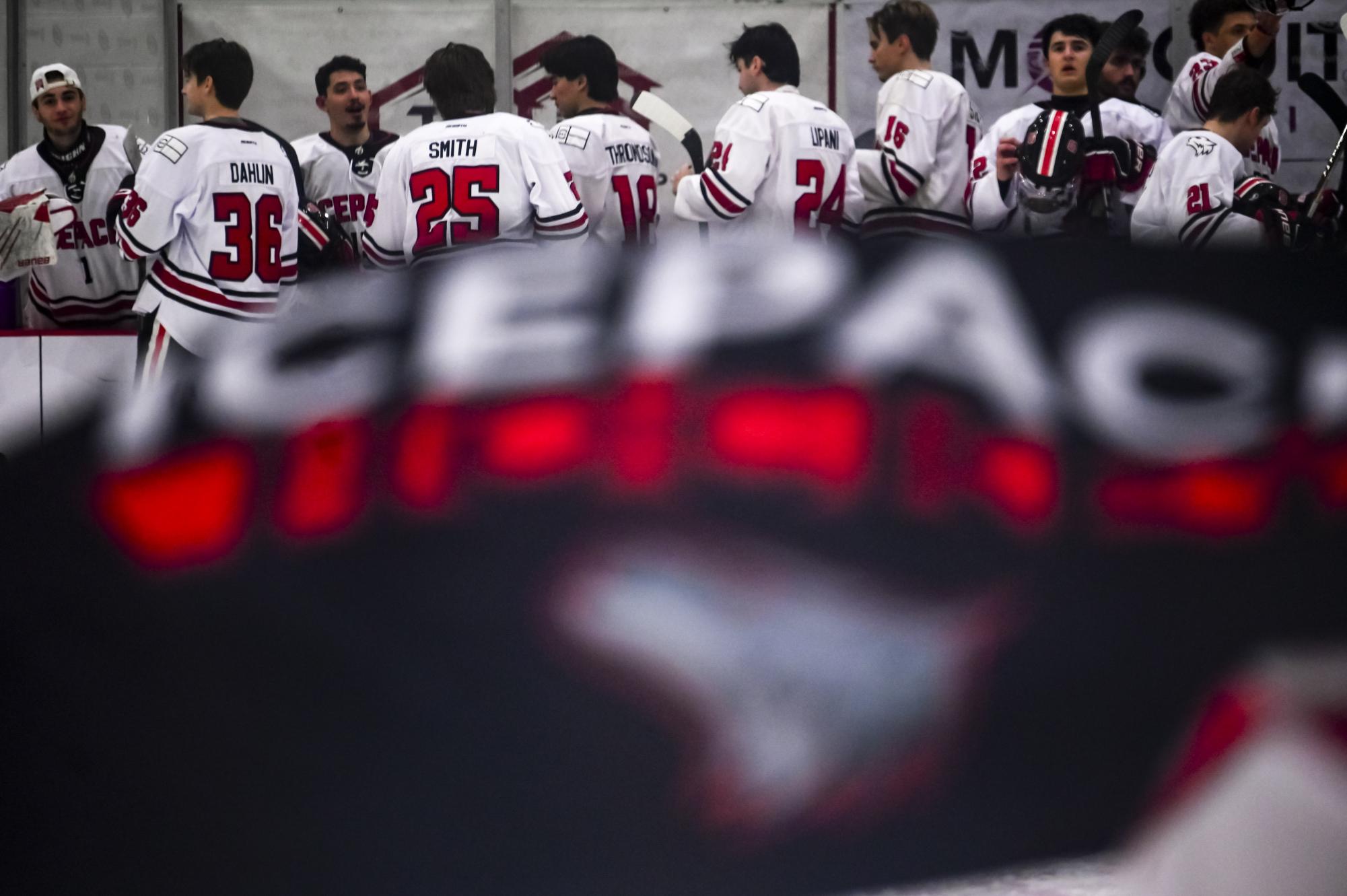 The team chats on the bench before the game against George Mason at Invisalign Arena on Friday, Nov. 21, 2025. NC State lost to George Mason 3-1.