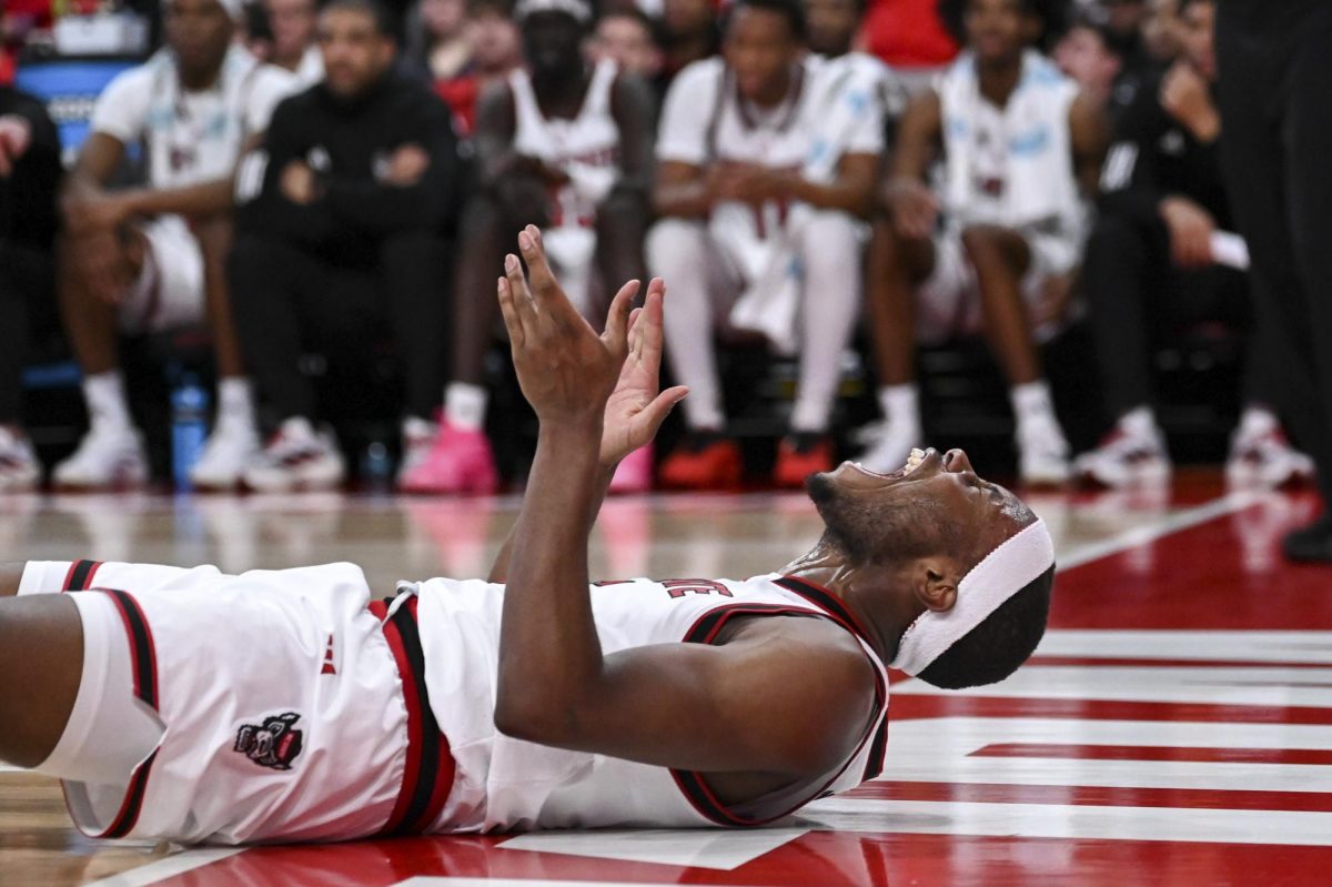 Senior guard Tre Holloman celebrates after drawing a foul during the game against VCU at Lenovo Center on Monday, Nov. 17, 2025. Holloman made all 10 of his free throw attempts. NC State defeated VCU 85-79.