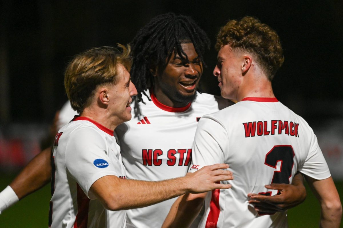 Junior forward Donavan Phillip celebrates with his teammates during the game against Marshall at Dail Soccer Field on Sunday, Nov. 23, 2025. Phillip recorded one goal. NC State beat Marshall 2-0.