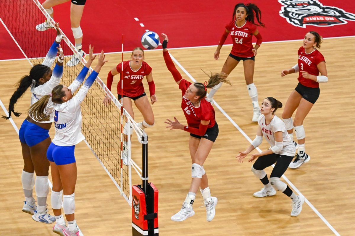Senior outside hitter Courtney Bryant goes for a kill during the senior day match against Southern Methodist University in Reynolds Coliseum on Saturday, Nov. 29, 2025. Bryant recorded a career high 24 kills in her final match with the Wolfpack. NC State lost to SMU 3-2.