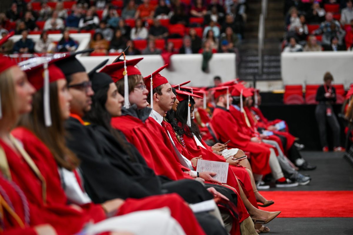Class of 2025 students listen intently to the speakers during the Fall Commencement Ceremony in the Lenovo Center on Saturday, Dec. 13, 2025. The Fall Commencement honors both summer and fall 2025 graduates.