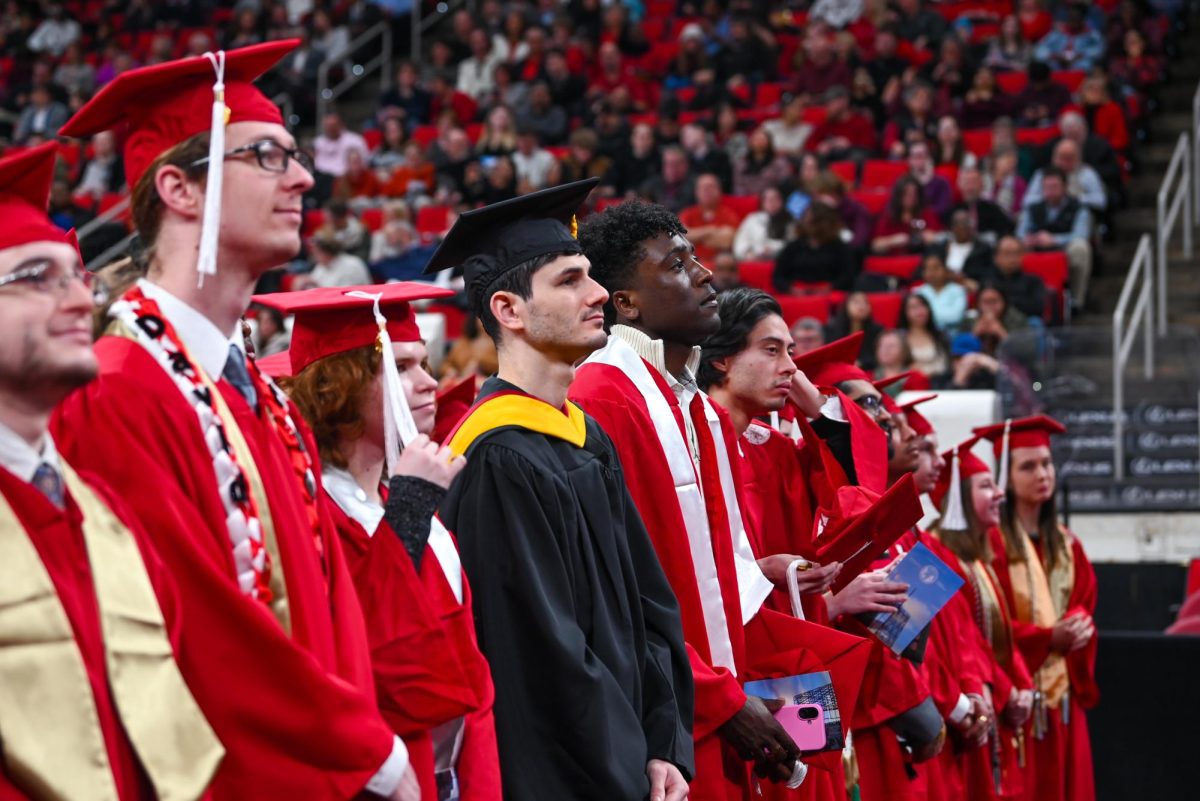 Class of 2025 students listen intently to the speakers during the Fall Commencement Ceremony in the Lenovo Center on Saturday, Dec. 13, 2025. The Fall Commencement honors both summer and fall 2025 graduates.