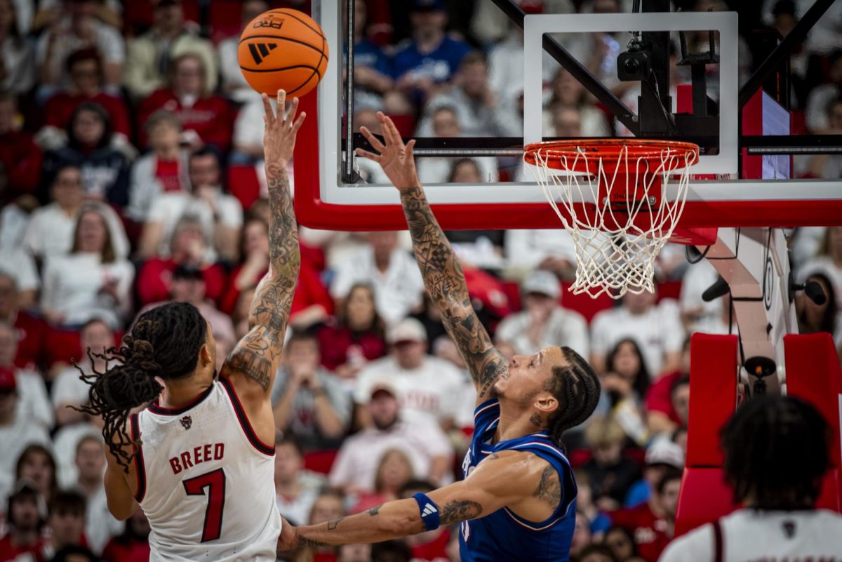 Redshirt senior guard Alyn Breed shoots a floater during the game against Kansas in the Lenovo Center on Saturday, Dec. 13, 2025. The Jayhawks defeated the Wolfpack 77-76 in overtime.