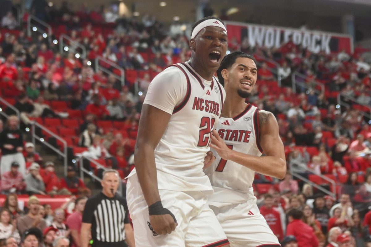Senior forward Ven-Allen Lubin yells after dunking during the men's basketball game against UNC-Asheville on Saturday, Dec. 6, 2025 in the Lenovo Center. Lubin scored 23 total points. NC State beat UNCA 75-63.