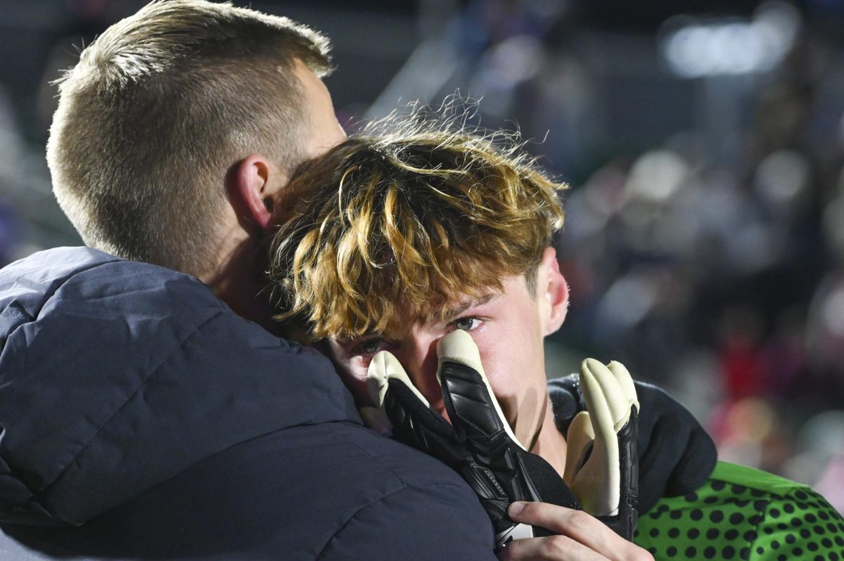 Senior goalkeeper Logan Erb tears up after losing the College Cup Championship game against Washington at First Horizon Stadium on Monday, Dec. 15, 2025. Erb had six saves and allowed three goals. The Wolfpack lost to the Huskies 3-2 after going into overtime.
