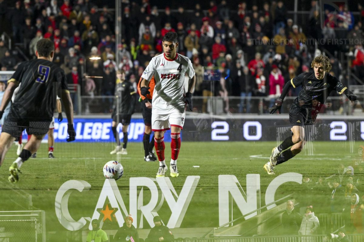 Sixth-year midfielder Carlos Santamaria runs with the ball during the Men's College Cup Championship game against Washington at First Horizon Stadium on Monday, Dec. 15, 2025. The Wolfpack lost to the Huskies 3-2 after going into overtime.