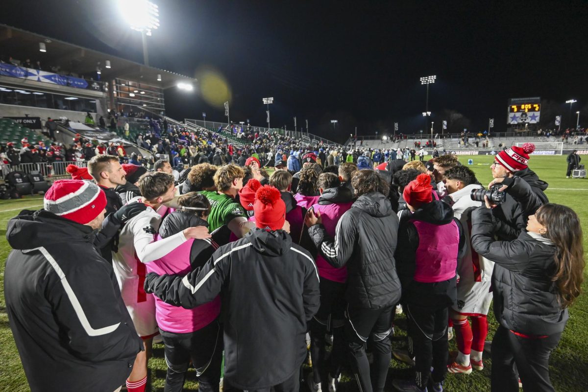 The NC State men's soccer team huddle up after the Men's College Cup Championship game against Washington at First Horizon Stadium on Monday, Dec. 15, 2025. The Wolfpack lost to the Huskies 3-2 after going into overtime.
