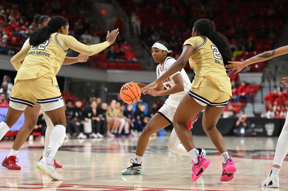 Freshman guard Destiny "Ky'She" Lunan dribbles the ball during the game against Georgia Tech at Reynolds Coliseum on Thursday, Dec. 18, 2025. The Wolfpack defeated the Yellow Jackets 87-58.