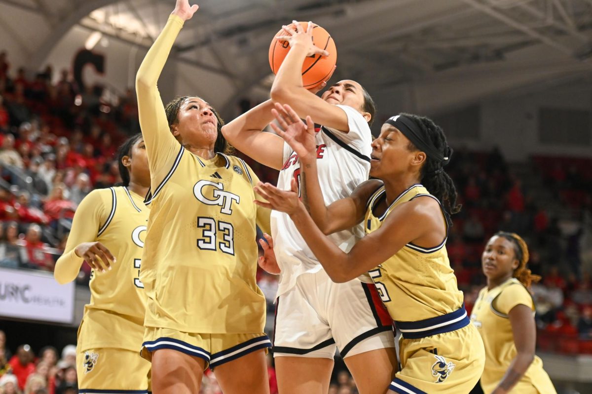 Sophomore guard Devyn Quigley tries to make a layup during the game against Georgia Tech at Reynolds Coliseum on Thursday, Dec. 18, 2025. The Wolfpack defeated the Yellow Jackets 87-58.