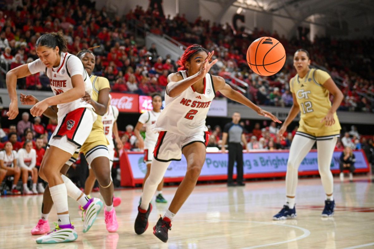 Junior guard Qadence Samuels steals the ball during the game against Georgia Tech at Reynolds Coliseum on Thursday, Dec. 18, 2025. The Wolfpack defeated the Yellow Jackets 87-58.
