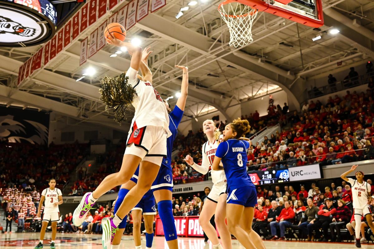 Junior forward Khamil Pierre attempts to score during the game against Seton Hall in Reynolds Coliseum on Sunday, Dec. 7, 2025. Pierre scored 11 points. The Wolfpack defeated the Pirates 61-53.