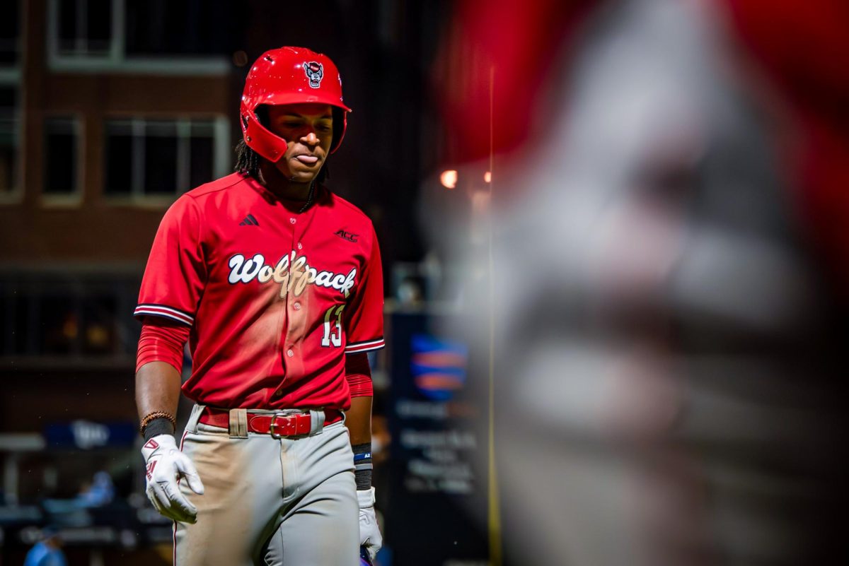 Junior outfielder Andrew Wiggins walks off the field during the exhibition against UNC at Durham Bulls Athletic Park on Thursday, Oct. 16, 2025. The Tar Heels defeated the Wolfpack 3-1.