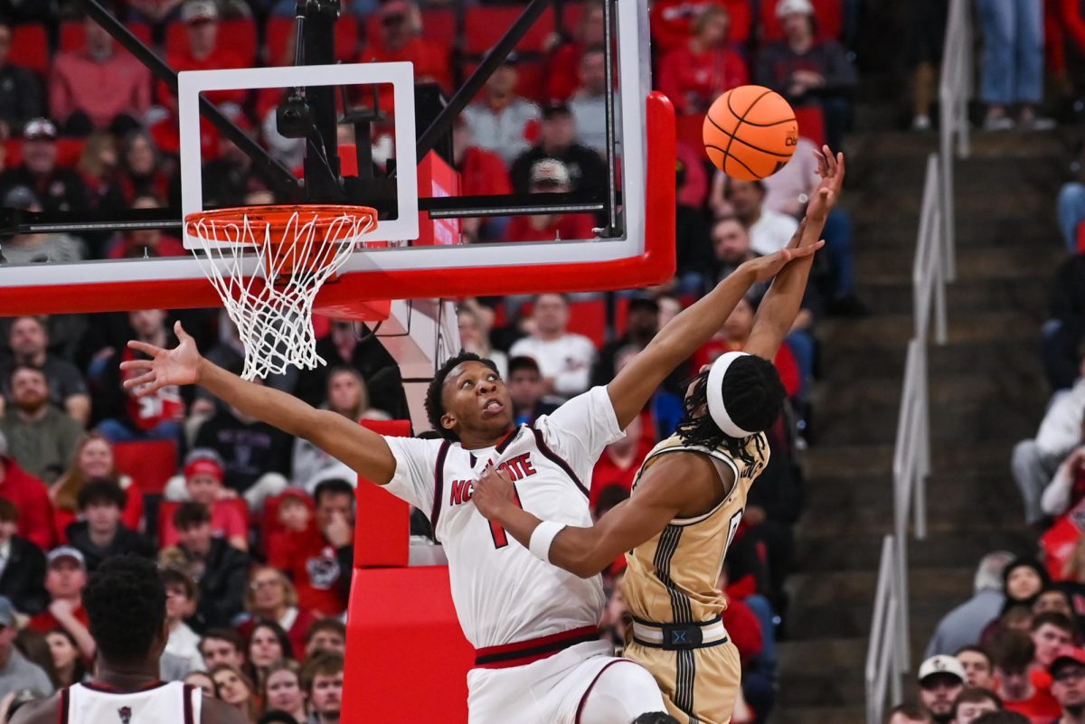 Senior guard Quadir Copeland defends a lay-up during the game against Georgia Tech at the Lenovo Center on Saturday, Jan. 17, 2026. Copeland scored a total of 16 points. The Wolfpack fell to the Yellow Jackets 74-78.