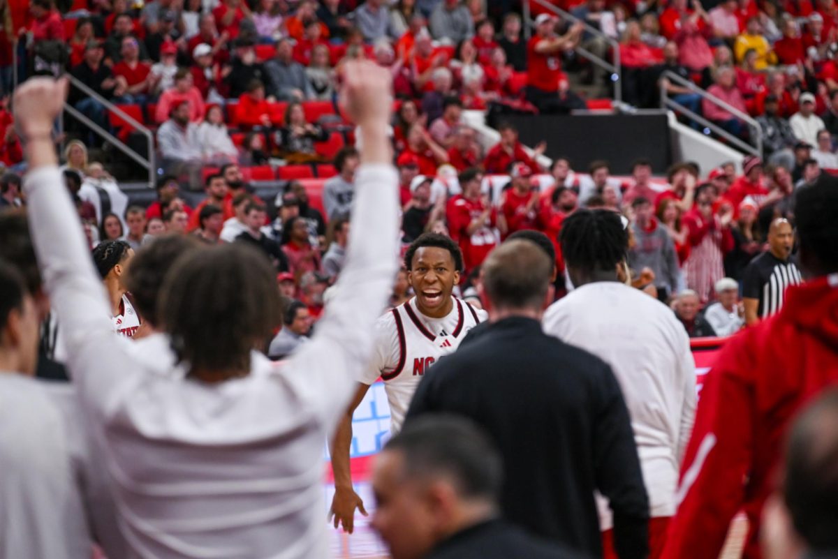 Senior guard Quadir Copeland yells in celebration to the bench during the game against Georgia Tech at the Lenovo Center on Saturday, Jan. 17, 2026. Copeland scored a total of 16 points. The Wolfpack fell to the Yellow Jackets 74-78.