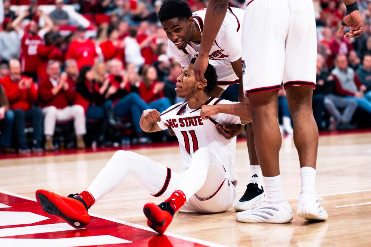 Senior guard Quadir Copeland pulls on his jersey during the game against Syracuse in the Lenovo Center on Tuesday, Jan. 27, 2026. Copeland scored 19 points. The Wolfpack defeated the Orange 88-68.