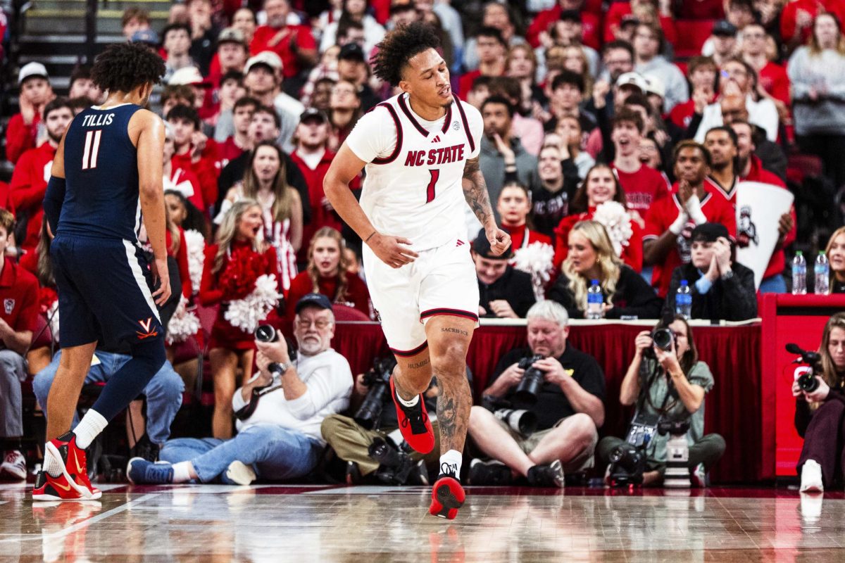 Senior forward Darrion Williams shakes his head after making a shot during the game against Virginia at Lenovo Center on Saturday, Jan. 3, 2026. Williams scored seven points. The Cavaliers beat the Wolfpack 76-61.