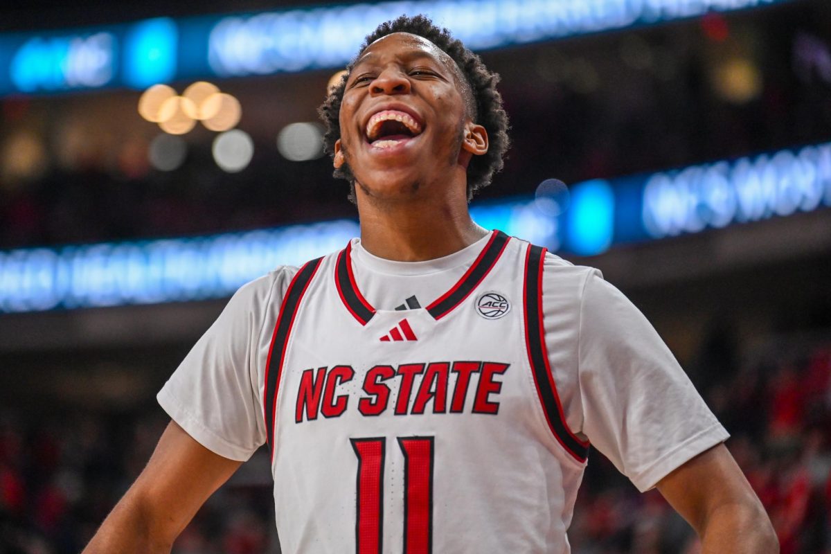 Senior guard Quadir Copeland yells following the game against Syracuse at the Lenovo Center on Tuesday, Jan. 27, 2026. Copeland finished with 19 points, nine assists, and four steals. The Wolfpack defeated the Orange 88-68. 
