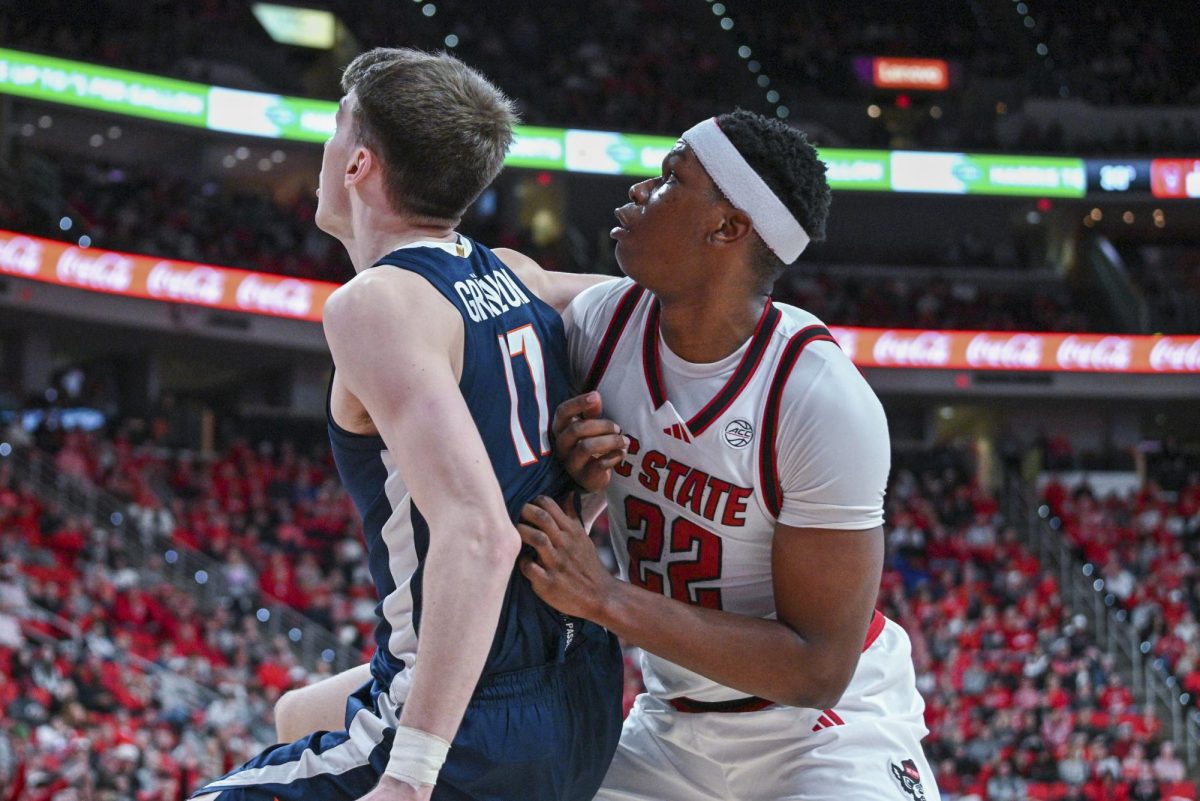 Senior forward Ven-Allen Lubin gets in position for a rebound during the game against Virginia at the Lenovo Center on Saturday, Jan. 3, 2026. Lubin scored seven points. The Cavaliers beat the Wolfpack 76-61.