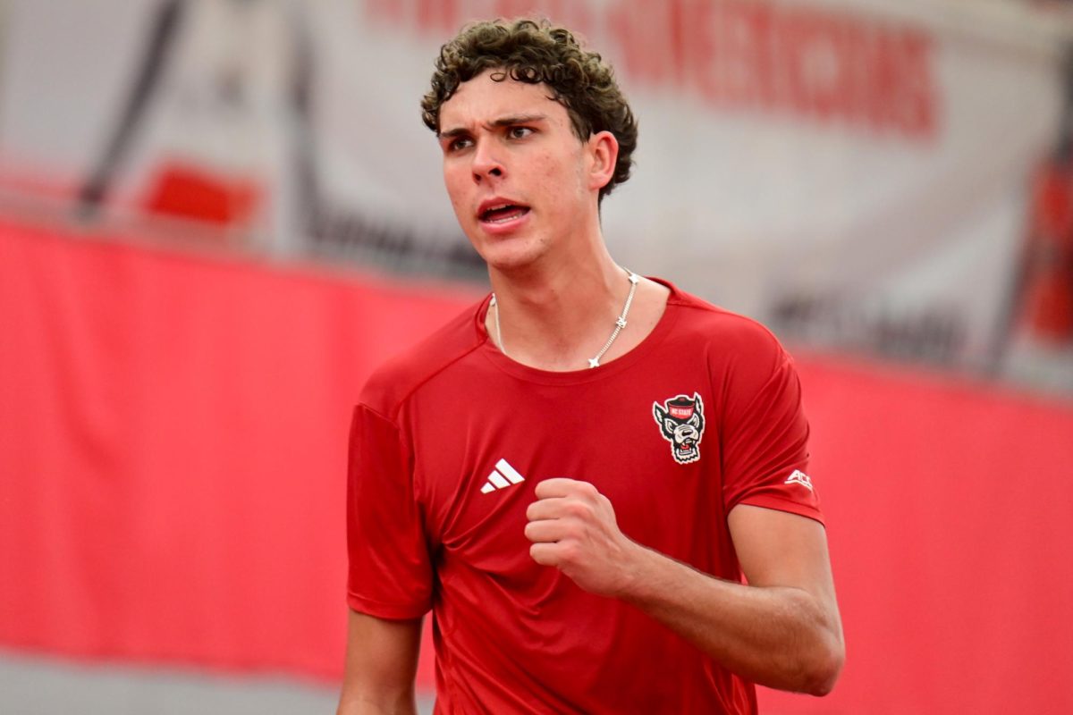 Redshirt sophomore Jules Leroux fist pumps during his singles match against Duke at the J.W. Isenhour Tennis Center on Friday, Jan. 23, 2026. Leroux lost his singles match 3-6, 2-6. NC State fell to Duke 4-2.