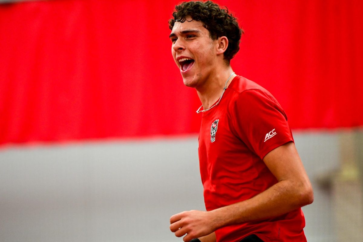 Redshirt sophomore Jules Leroux yells during his singles match against Duke at the J.W. Isenhour Tennis Center on Friday, Jan. 23, 2026. Leroux lost his singles match 3-6, 2-6. NC State fell to Duke 4-2.