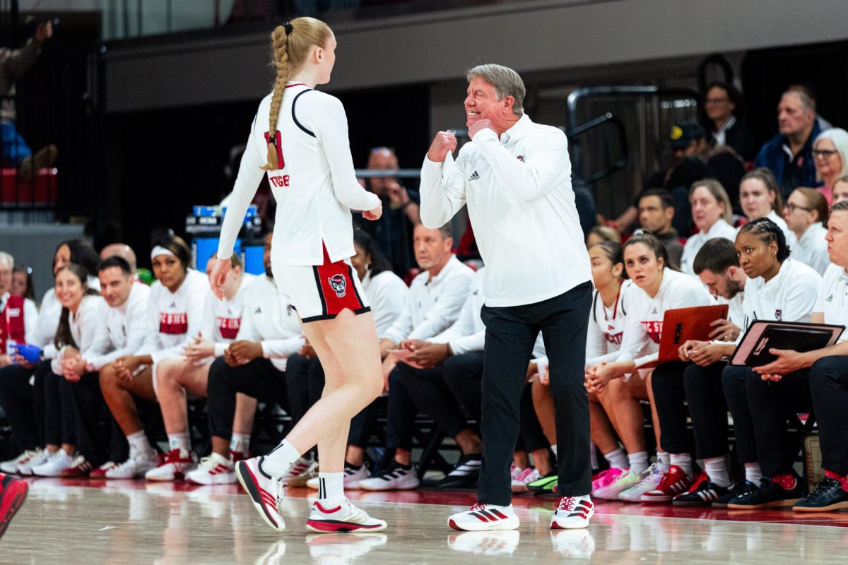 Sophomore forward Tilda Trygger speaks to Head Coach Wes Moore during the game against SMU in Reynolds Coliseum on Sunday, Jan. 11, 2026. The Wolfpack defeated the Mustangs 90-54.