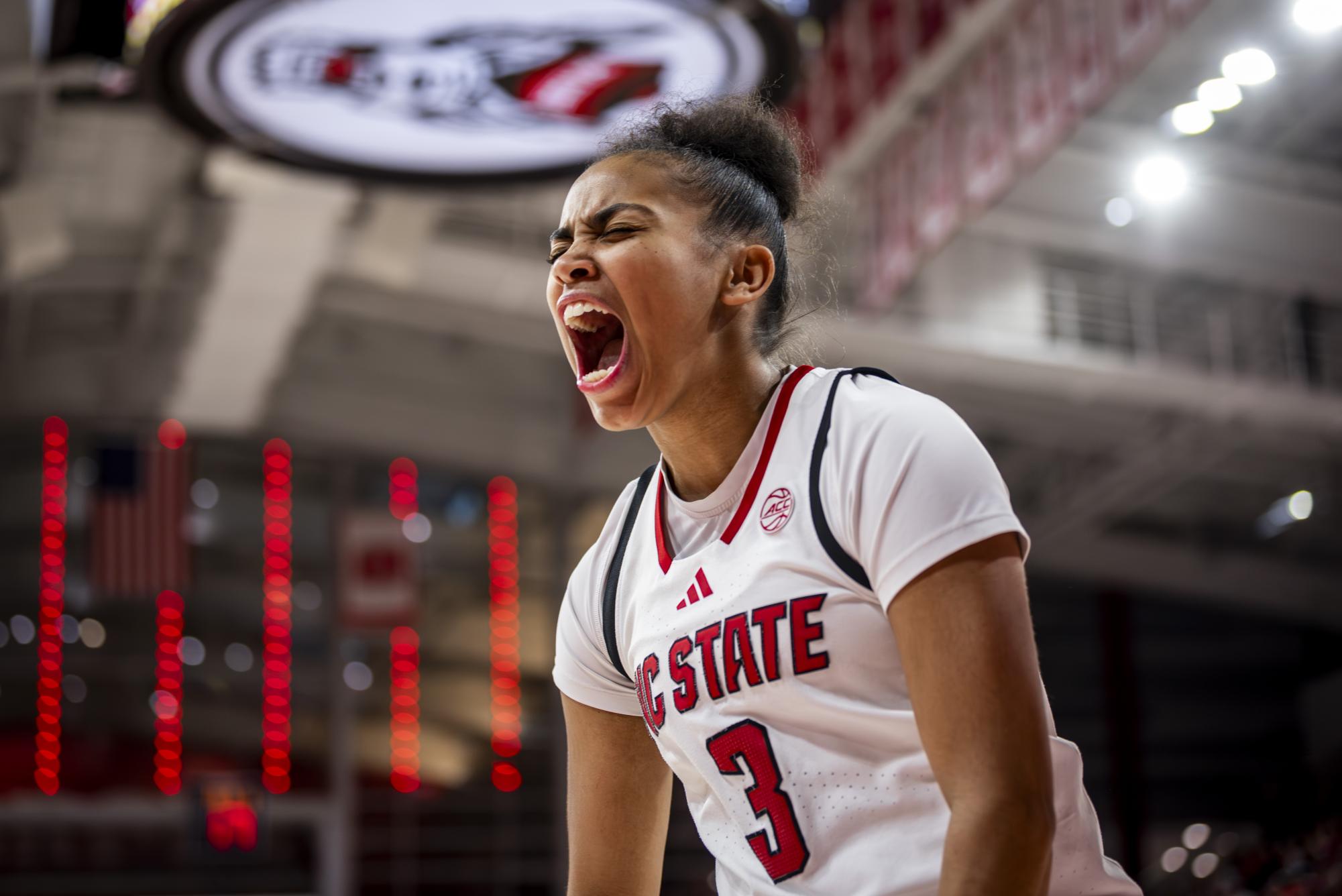 Sophomore guard Zamareya Jones celebrates after scoring an and-one during the game against Louisville in Reynolds Coliseum on Sunday, Jan. 18, 2026. Jones scored 20 points. The Cardinals defeated the Wolfpack 88-80 in overtime.