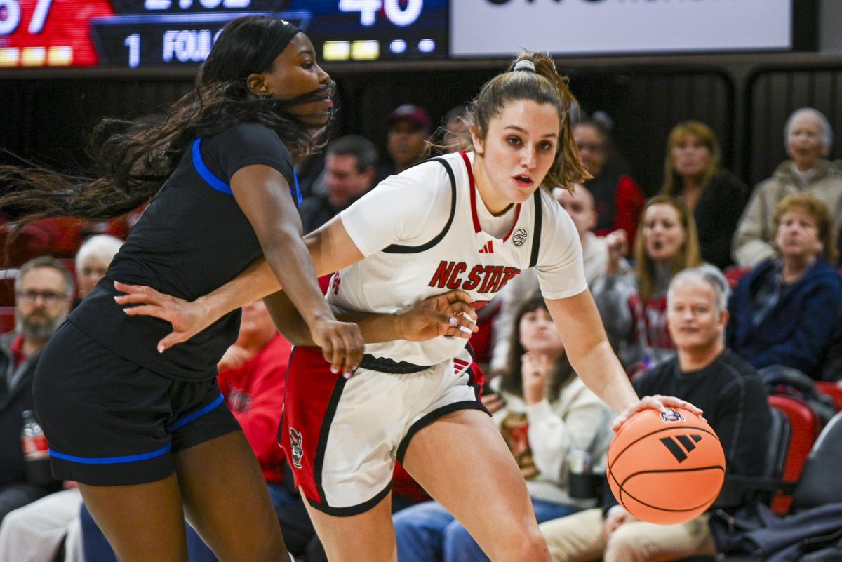 Freshman guard Adelaide Jernigan dribbles the ball during the game against SMU in Reynolds Coliseum on Sunday, Jan. 11, 2026. The Wolfpack defeated the Mustangs 90-54.