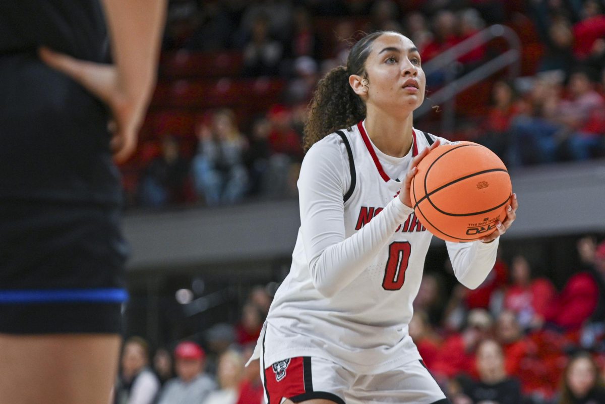 Sophomore guard Devyn Quigley shoots a free throw during the game against SMU in Reynolds Coliseum on Sunday, Jan. 11, 2026. The Wolfpack defeated the Mustangs 90-54.