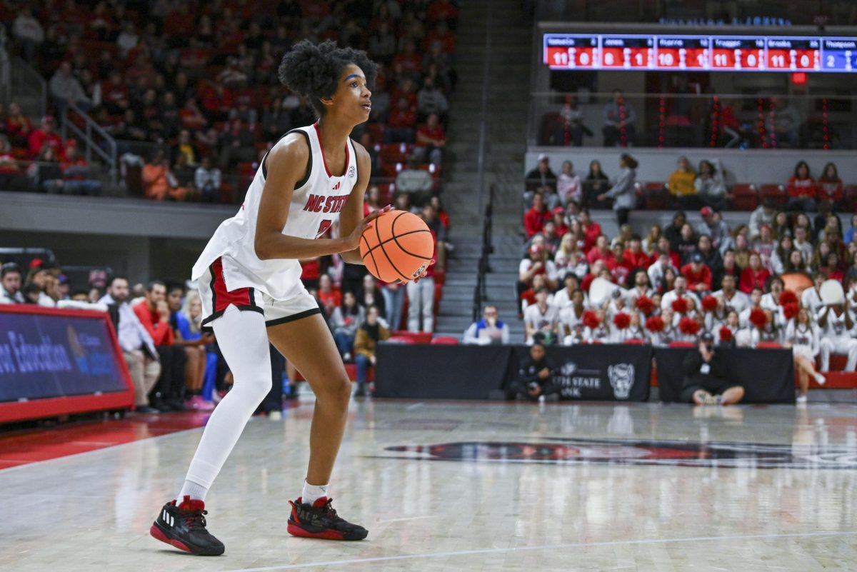 Junior guard Qadence Samuels prepares to shoot the ball during the game against SMU in Reynolds Coliseum on Sunday, Jan. 11, 2026. The Wolfpack defeated the Mustangs 90-54.