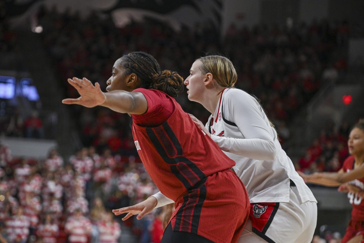 Junior forward Maddie Cox plays defense during the game against Stanford at Reynolds Coliseum on Thursday, Jan. 1, 2026. Cox scored a total of seven points. The Wolfpack defeated the Cardinals 74-46.