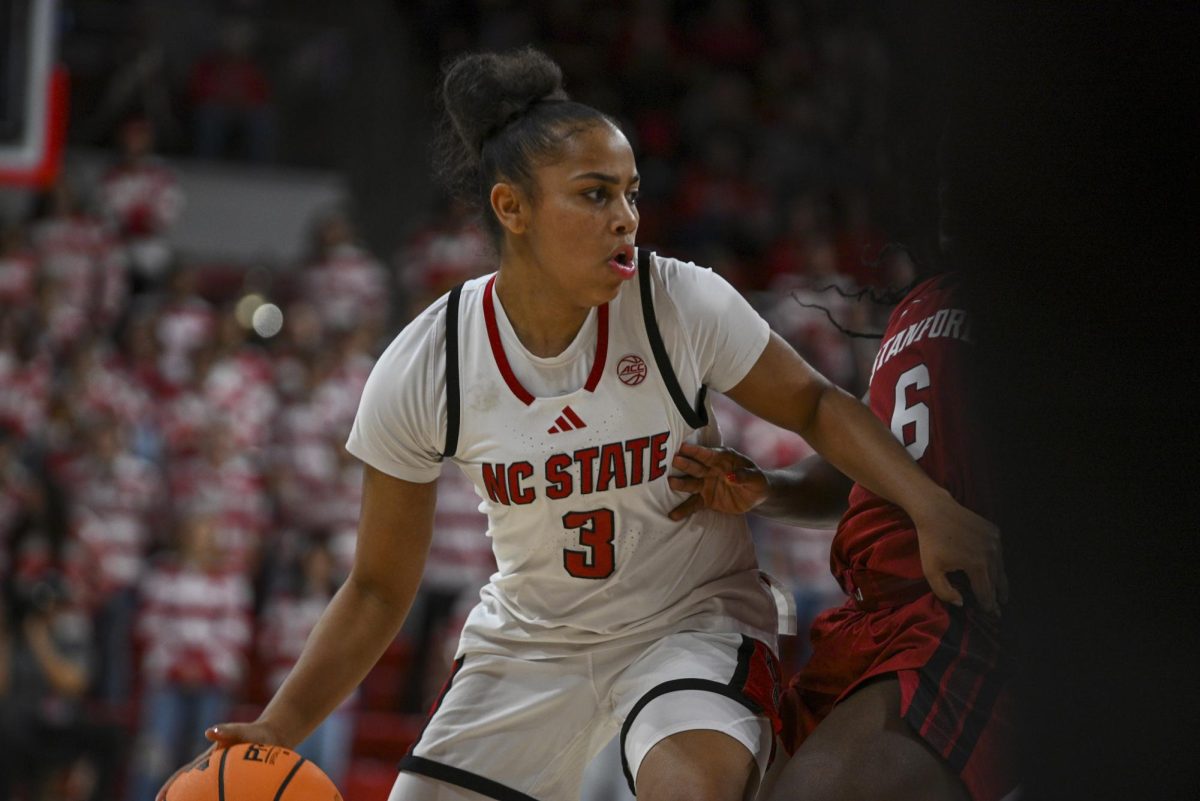 Sophomore guard Zamareya Jones dribbles the ball during the game against Stanford at Reynolds Coliseum on Thursday, Jan. 1, 2026. Jones scored a total of 10 points. The Wolfpack defeated the Cardinals 74-46.