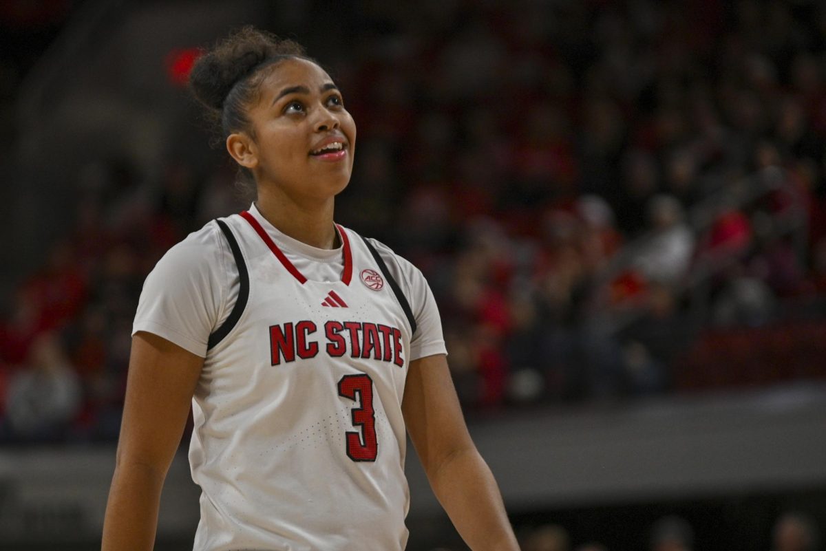 Sophomore guard Zamareya Jones smiles after the play during the game against Stanford at Reynolds Coliseum on Thursday, Jan. 1, 2026. Jones scored a total of 10 points. The Wolfpack defeated the Cardinals 74-46.