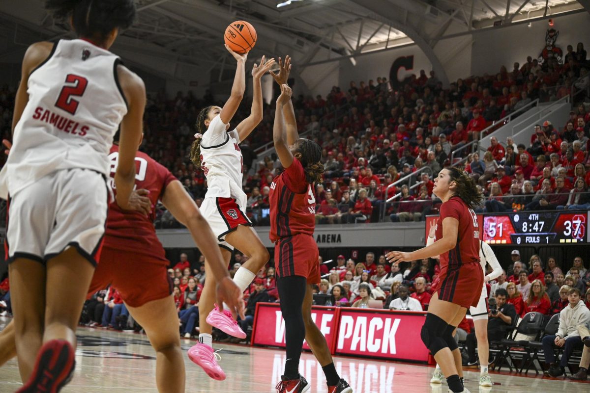 Junior forward Khamil Pierre shoots the ball during the game against Stanford at Reynolds Coliseum on Thursday, Jan. 1, 2026. Pierre scored a total of 10 points. The Wolfpack defeated the Cardinals 74-46.