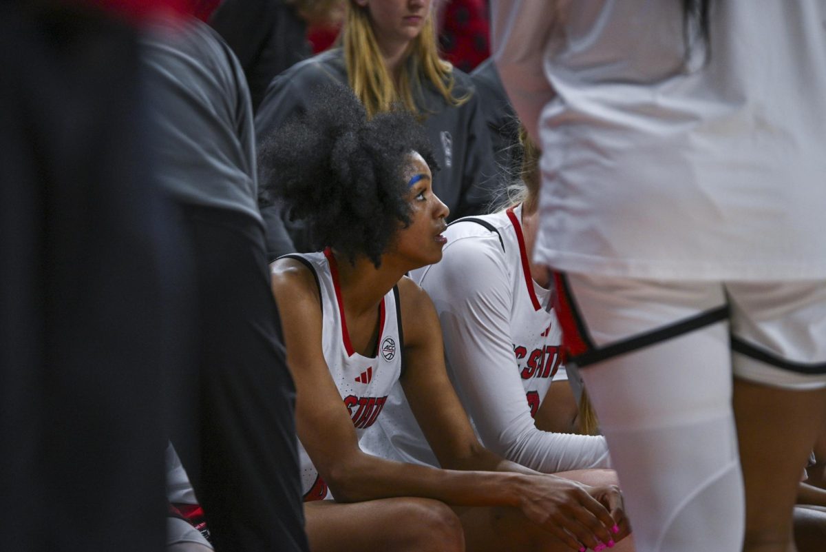 Junior guard Qadence Samuels prepares on the bench during the game against Stanford at Reynolds Coliseum on Thursday, Jan. 1, 2026. Samuels scored a total of five points. The Wolfpack defeated the Cardinals 74-46.