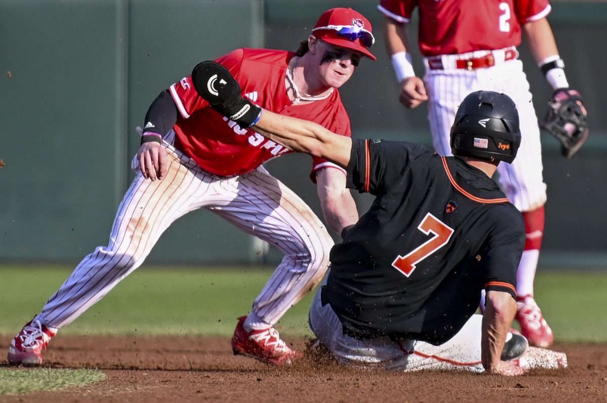 Junior infielder Luke Nixon makes a play during the game against Princeton in Doak Field at Dail Park on Saturday, Feb. 21, 2026. The Tigers defeated the Wolfpack 1-0.