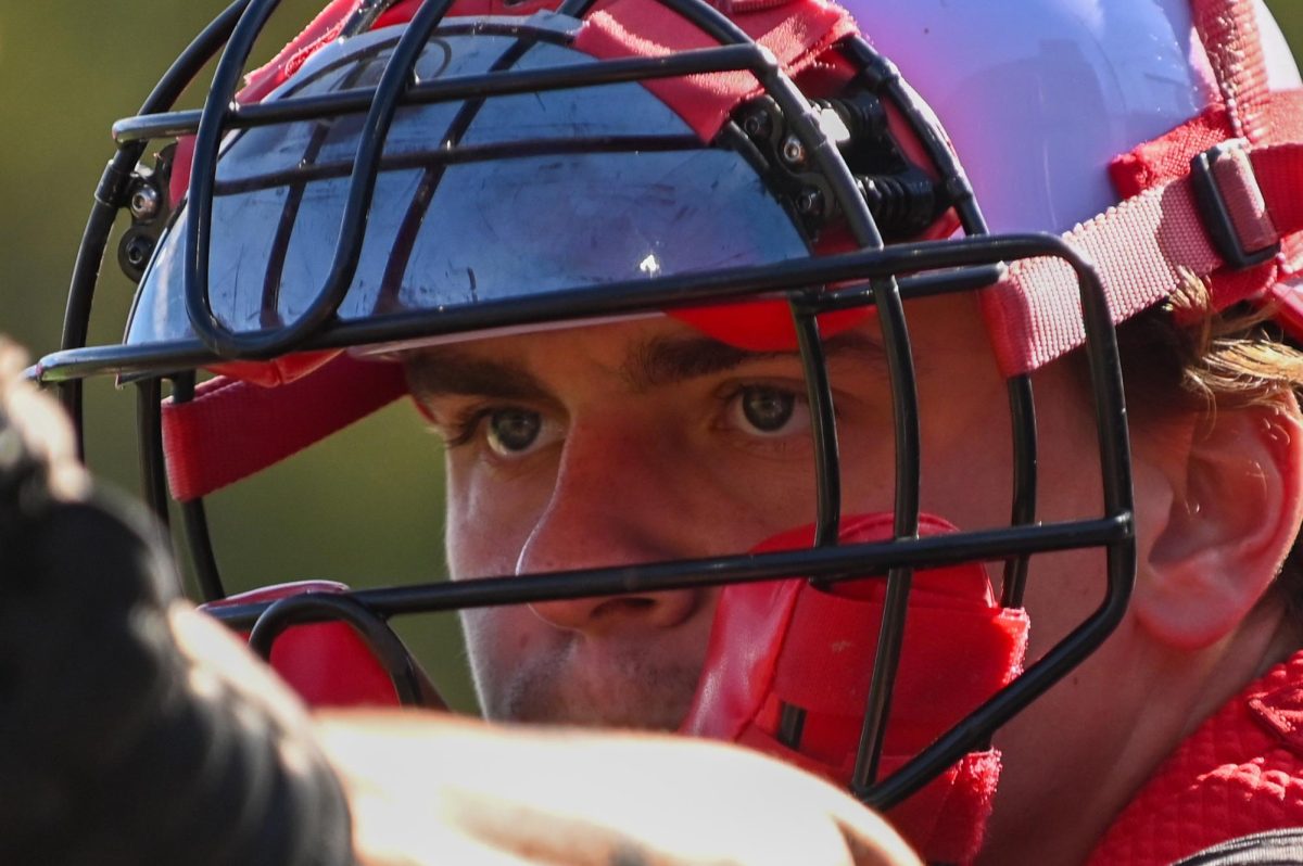 Redshirt-junior catcher Preston Bonn catches the ball during warmups before the game against Princeton at Doak Field at Dail Park on Friday, Feb. 20, 2026. NC State beat Princeton 6-4.