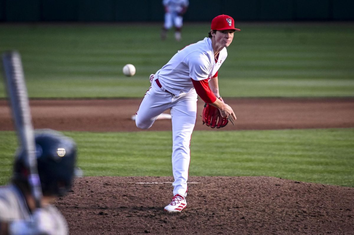 Junior right-handed pitcher Heath Andrews launches the ball during the game against Richmond at Doak Field in Dail Park on Tuesday, Feb. 24, 2026. The Wolfpack defeated the Spiders 27-0.