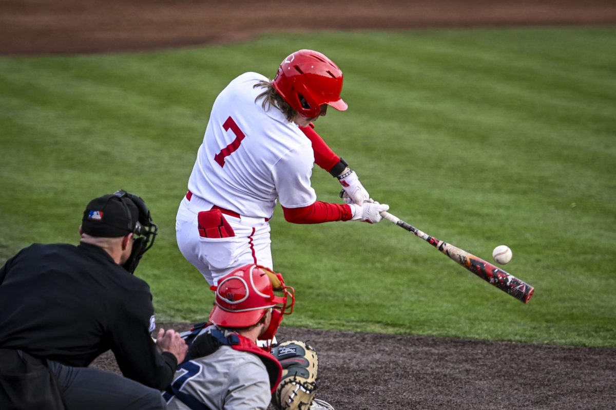 Senior outfielder Brayden Fraasman makes contact with the ball during the game against Richmond at Doak Field in Dail Park on Tuesday, Feb. 24, 2026. The Wolfpack defeated the Spiders 27-0.