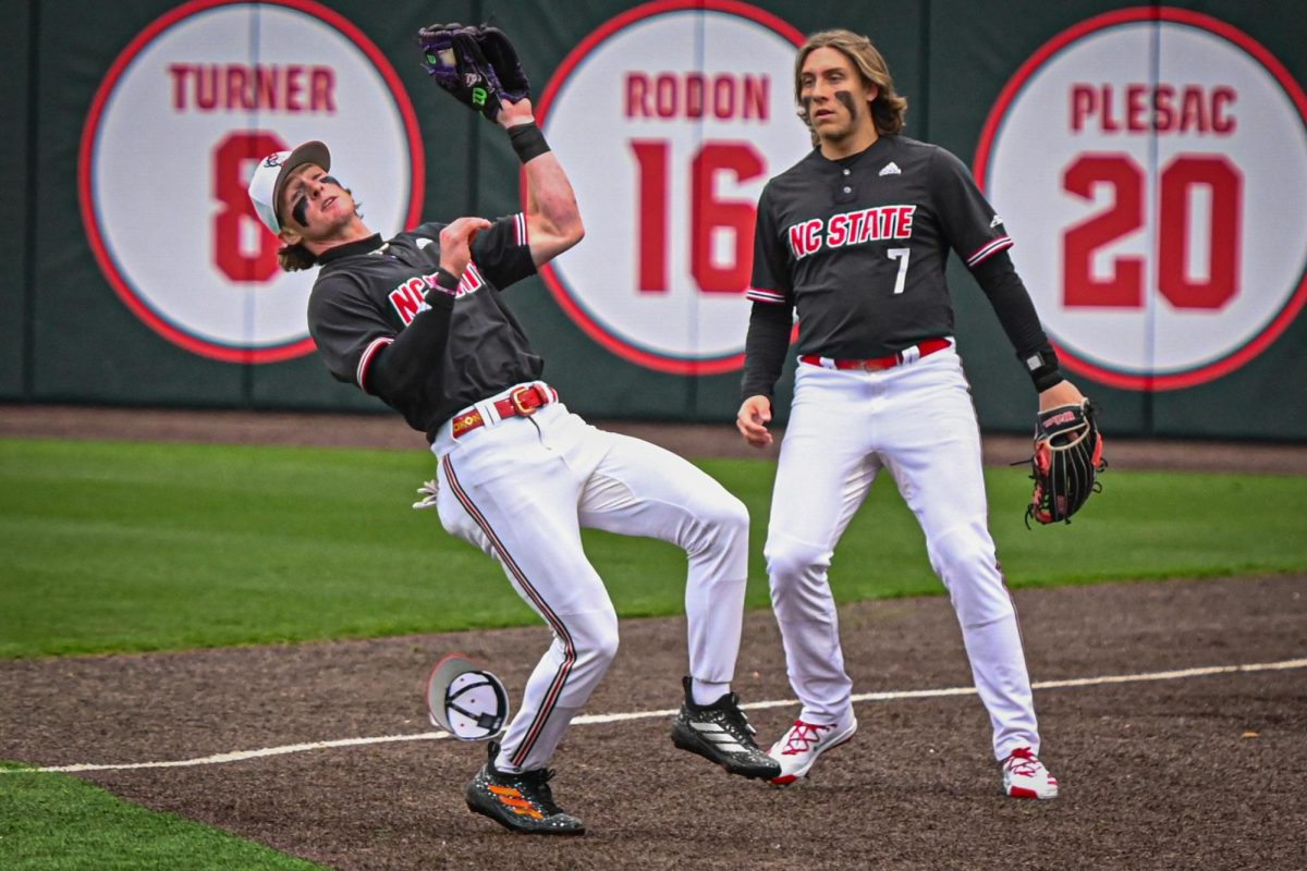 NC State junior infielder Luke Nixon catches a foul ball during the game against Sacred Heart in Doak Field at Dail Park on Friday, Feb. 27, 2026. The Wolfpack defeated the Pioneers 17-4.