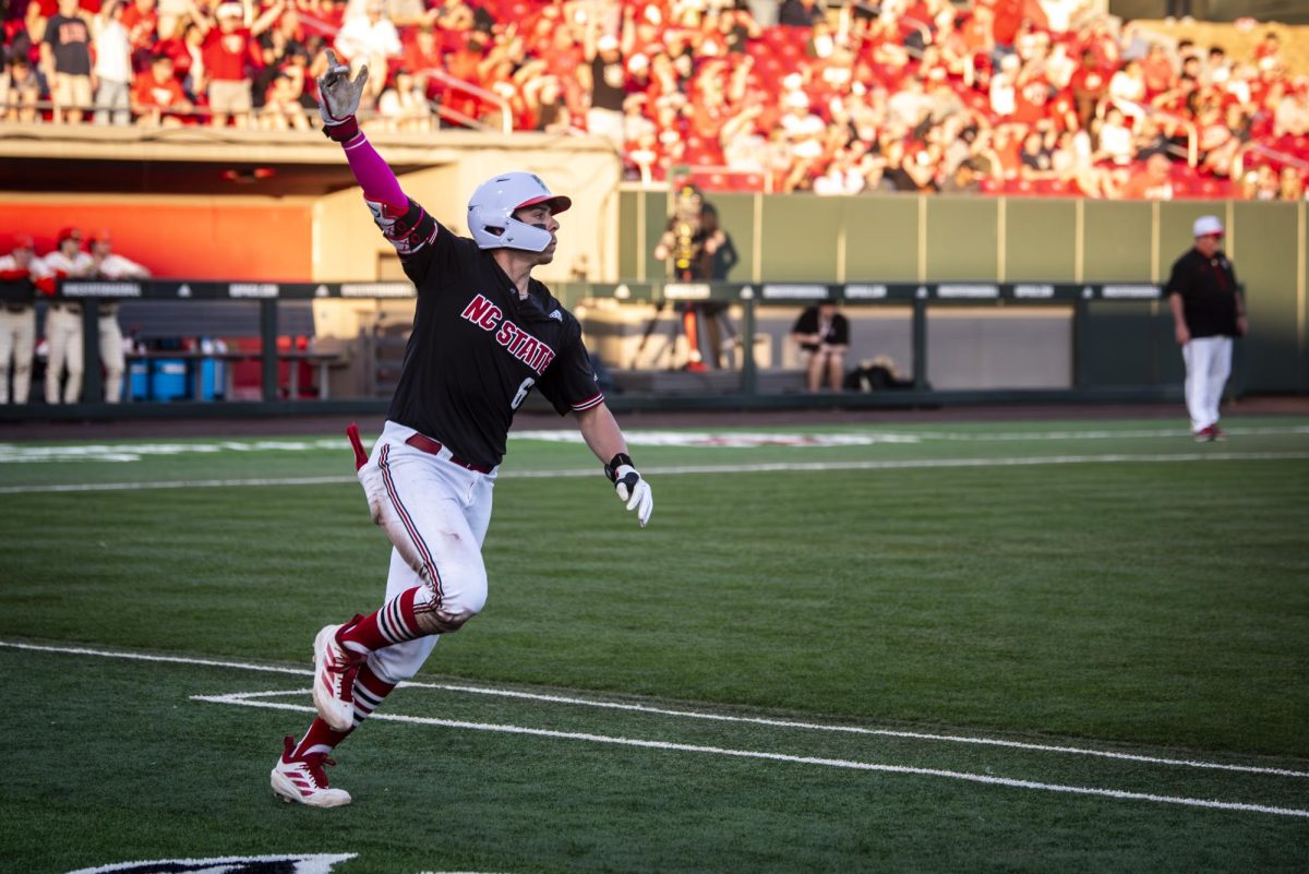 NC State senior first-baseman Dalton Bargo celebrates after hitting a home run during the game against Princeton in Doak Field at Dail Park on Friday, Feb. 20, 2026. Bargo recorded three RBIs. The Wolfpack defeated the Tigers 6-4.