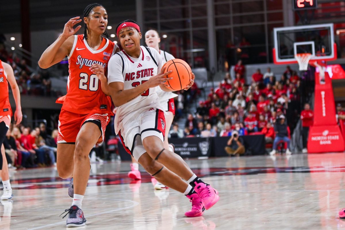 Junior guard Zoe Brooks drives to the basket during the game against Syracuse in Reynolds Coliseum on Sunday, Feb. 22, 2026. Brooks had 20 points and five rebounds. The Wolfpack defeated the Orange 82-69.