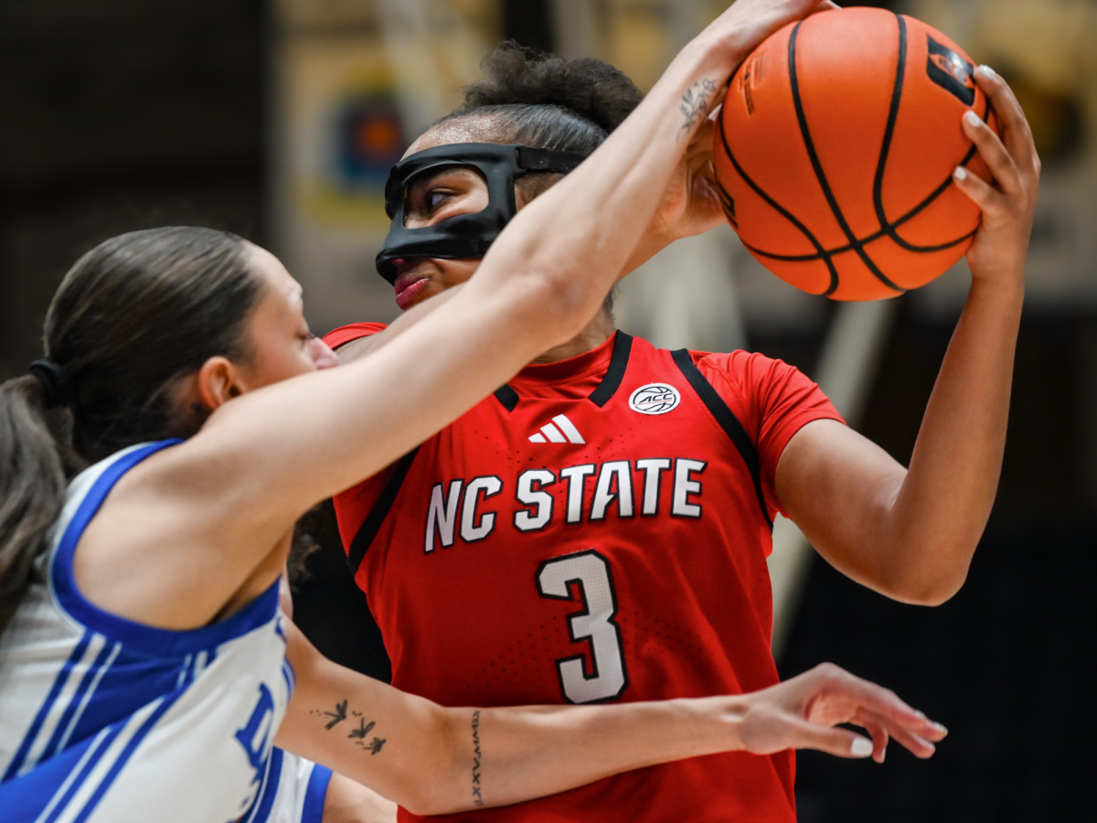 Sophomore guard Zamareya Jones evades a Duke defender’s steal attempt during the game against the Blue Devils on Thursday, Feb. 19, 2026, at Cameron Indoor Stadium. Jones finished with six points for the Wolfpack. NC State fell to Duke 83–65.