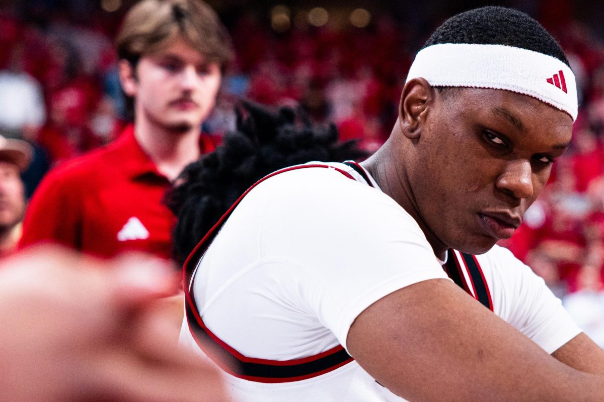 Senior forward Ven-Allen Lubin watches the UNC players enter the court before the game against North Carolina at the Lenovo Center on Tuesday, Feb. 17, 2026. Lubin finished with 12 points against his former team. The Wolfpack defeated the Tar Heels 82–58.