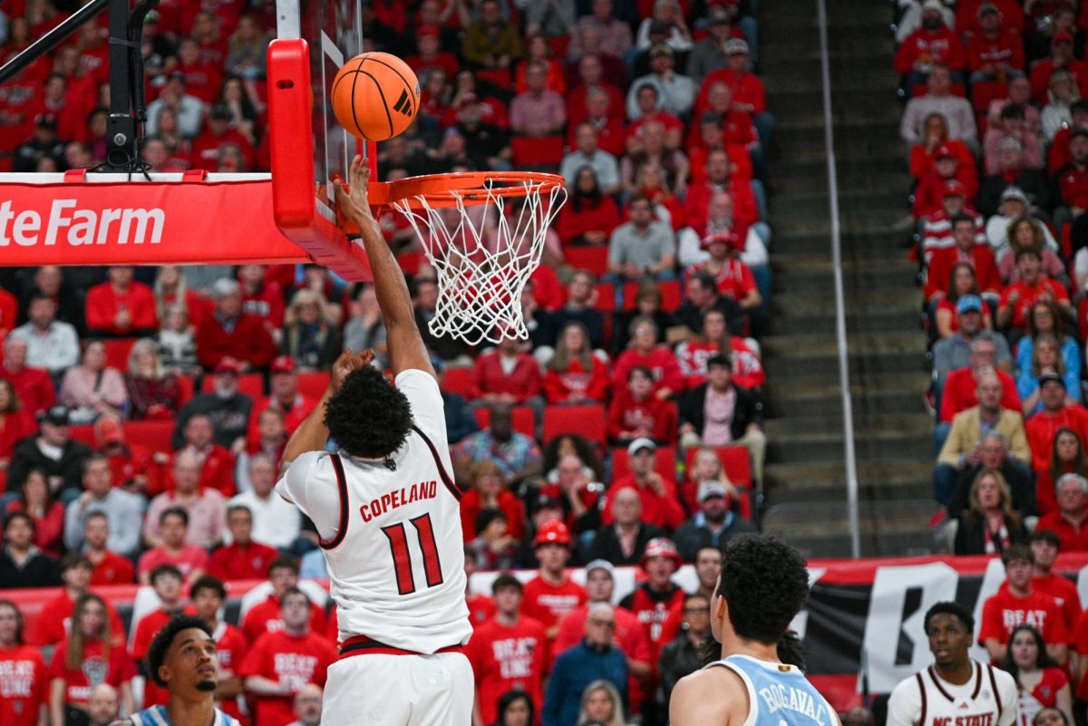 Senior guard Quadir Copeland makes a layup during the game against North Carolina at the Lenovo Center on Tuesday, Feb. 17, 2026. Copeland finished with 20 points, seven assists, and six rebounds. The Wolfpack defeated the Tar Heels 82-58.
