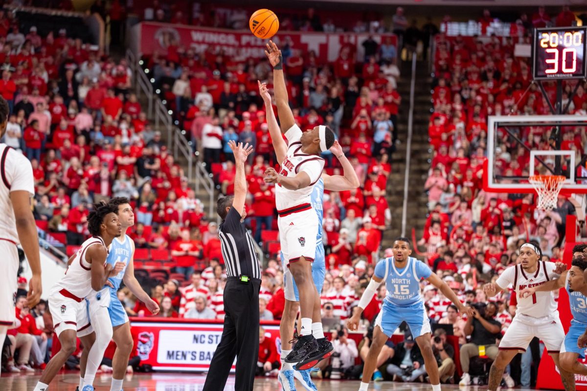 Senior forward Ven-Allen Lubin jumps for the ball during the game against North Carolina at the Lenovo Center on Tuesday, Feb. 17, 2026. Lubin finished with 12 points against his former team. The Wolfpack defeated the Tar Heels 82–58.