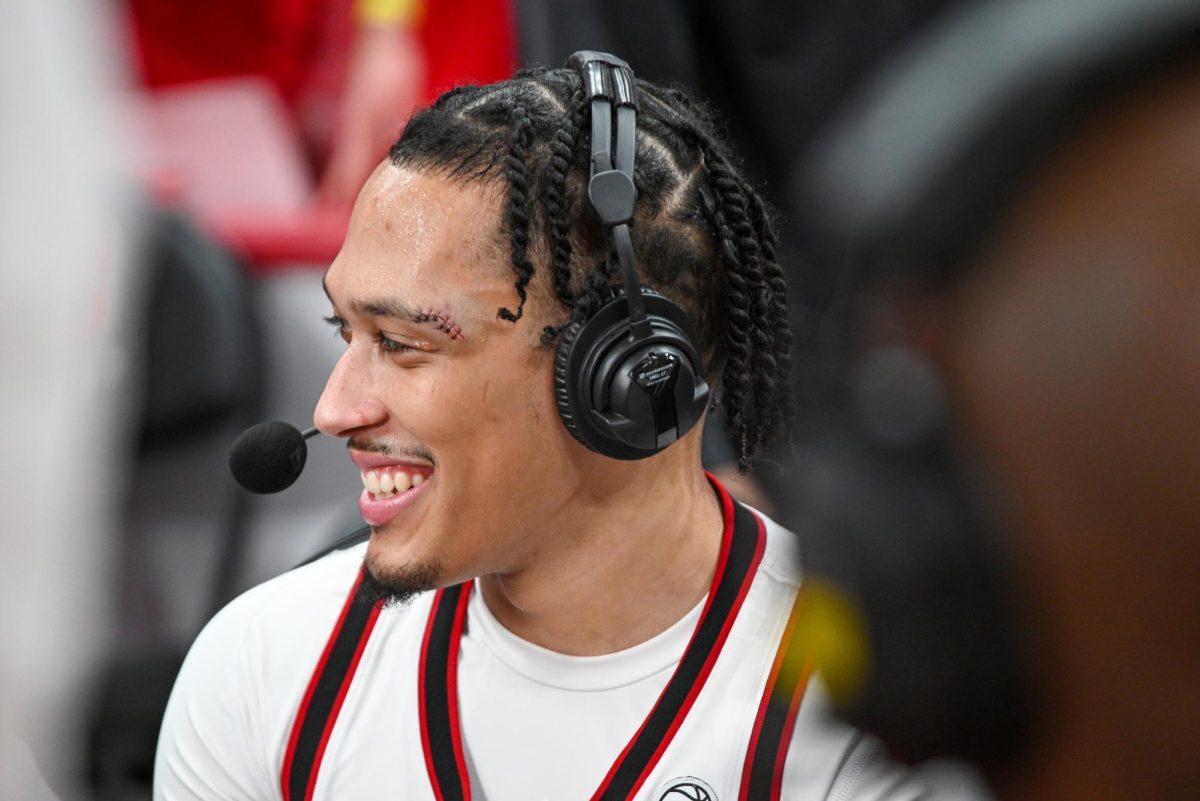 Senior forward Darrion Williams smiles while being interviewed after the game against North Carolina at the Lenovo Center on Tuesday, Feb. 17, 2026. Williams finished with 13 points. The Wolfpack defeated the Tar Heels 82-58.